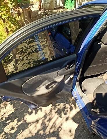 Синий Дэу Ланос, объемом двигателя 1.5 л и пробегом 170 тыс. км за 1850 $, фото 6 на Automoto.ua