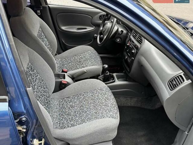 Синій Деу Ланос, об'ємом двигуна 1.5 л та пробігом 59 тис. км за 4200 $, фото 49 на Automoto.ua