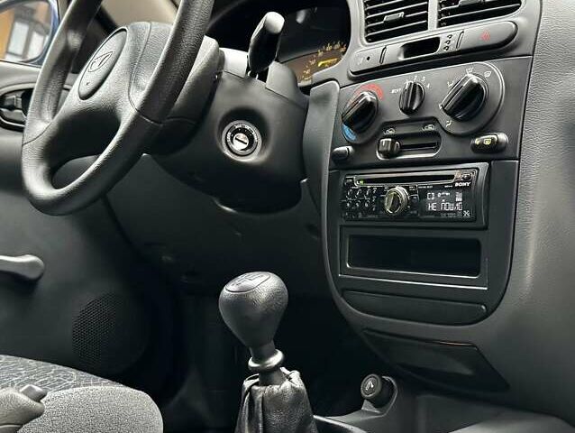 Синій Деу Ланос, об'ємом двигуна 1.5 л та пробігом 59 тис. км за 4200 $, фото 52 на Automoto.ua