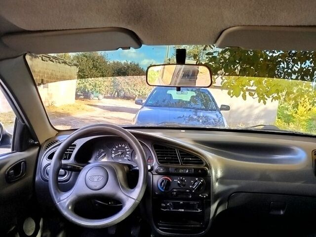 Синий Дэу Ланос, объемом двигателя 1.5 л и пробегом 195 тыс. км за 2400 $, фото 6 на Automoto.ua