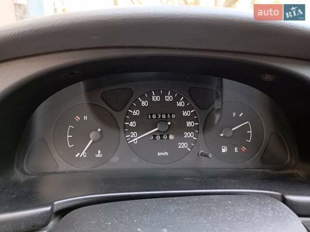 Синій Деу Ланос, об'ємом двигуна 1.39 л та пробігом 167 тис. км за 2400 $, фото 11 на Automoto.ua