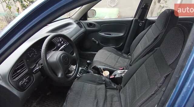 Синій Деу Ланос, об'ємом двигуна 1.5 л та пробігом 182 тис. км за 1350 $, фото 2 на Automoto.ua