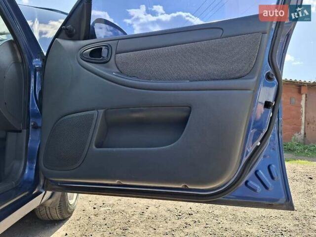 Синій Деу Ланос, об'ємом двигуна 1.5 л та пробігом 153 тис. км за 3500 $, фото 29 на Automoto.ua