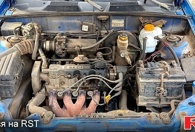 Синий Дэу Ланос, объемом двигателя 1.5 л и пробегом 338 тыс. км за 950 $, фото 4 на Automoto.ua