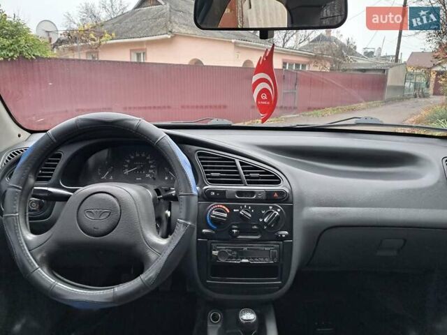 Синій Деу Ланос, об'ємом двигуна 1.5 л та пробігом 231 тис. км за 2100 $, фото 10 на Automoto.ua