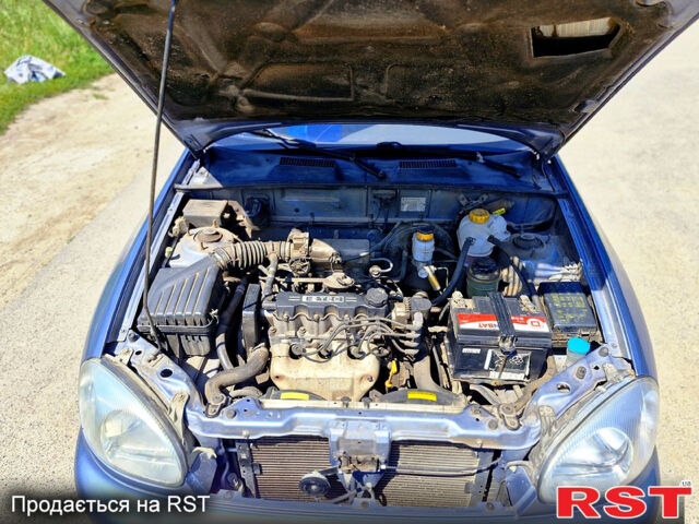 Синий Дэу Ланос, объемом двигателя 1.5 л и пробегом 177 тыс. км за 2700 $, фото 3 на Automoto.ua