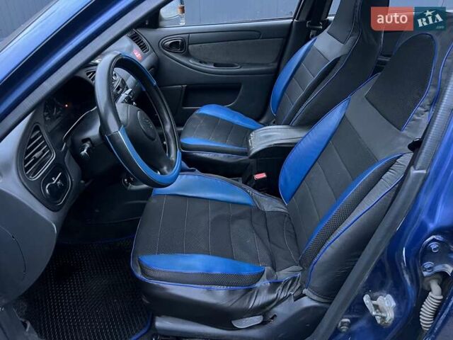 Синий Дэу Ланос, объемом двигателя 1.5 л и пробегом 243 тыс. км за 2500 $, фото 6 на Automoto.ua