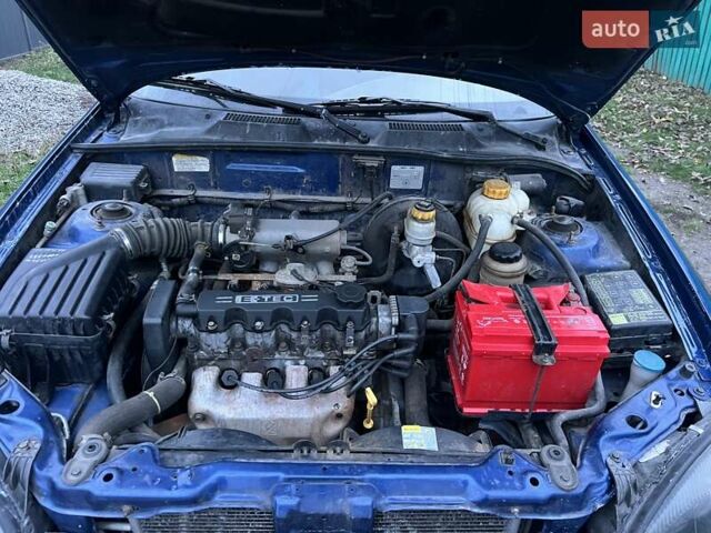 Синий Дэу Ланос, объемом двигателя 1.5 л и пробегом 243 тыс. км за 2500 $, фото 9 на Automoto.ua