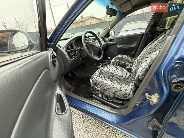 Синий Дэу Ланос, объемом двигателя 1.35 л и пробегом 250 тыс. км за 2500 $, фото 8 на Automoto.ua