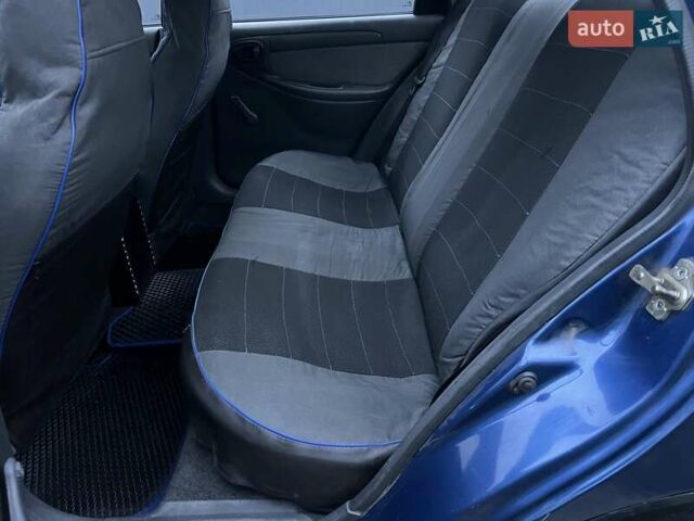 Синий Дэу Ланос, объемом двигателя 1.5 л и пробегом 243 тыс. км за 2500 $, фото 7 на Automoto.ua