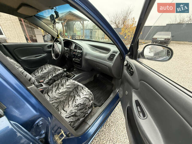 Синий Дэу Ланос, объемом двигателя 1.35 л и пробегом 250 тыс. км за 2500 $, фото 9 на Automoto.ua