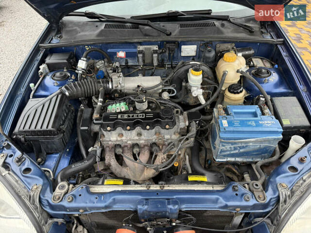 Синий Дэу Ланос, объемом двигателя 1.35 л и пробегом 250 тыс. км за 2500 $, фото 1 на Automoto.ua