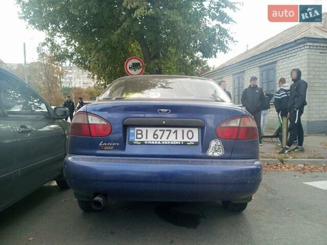 Синій Деу Ланос, об'ємом двигуна 1.5 л та пробігом 243 тис. км за 1250 $, фото 3 на Automoto.ua