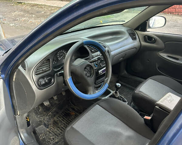 Синий Дэу Ланос, объемом двигателя 1.5 л и пробегом 230 тыс. км за 2350 $, фото 3 на Automoto.ua