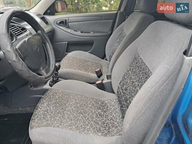Синий Дэу Ланос, объемом двигателя 1.5 л и пробегом 153 тыс. км за 2850 $, фото 17 на Automoto.ua