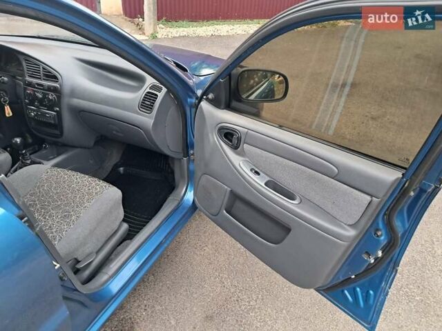 Синий Дэу Ланос, объемом двигателя 1.5 л и пробегом 153 тыс. км за 2850 $, фото 3 на Automoto.ua