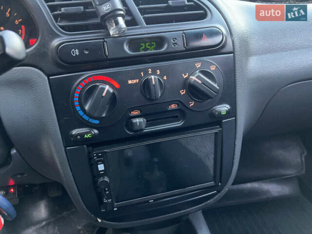 Синий Дэу Ланос, объемом двигателя 1.5 л и пробегом 122 тыс. км за 3100 $, фото 10 на Automoto.ua