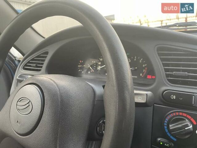 Синий Дэу Ланос, объемом двигателя 1.5 л и пробегом 65 тыс. км за 3200 $, фото 14 на Automoto.ua