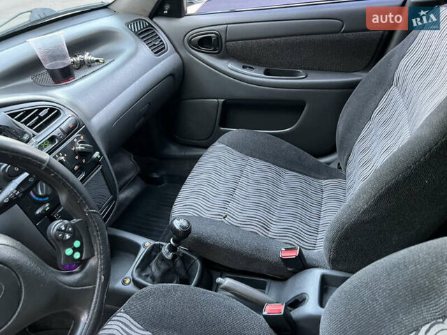 Синий Дэу Ланос, объемом двигателя 1.5 л и пробегом 122 тыс. км за 3100 $, фото 7 на Automoto.ua