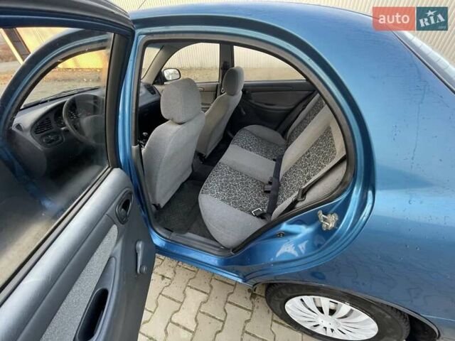 Синий Дэу Ланос, объемом двигателя 1.5 л и пробегом 65 тыс. км за 3200 $, фото 1 на Automoto.ua