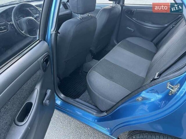 Синий Дэу Ланос, объемом двигателя 1.5 л и пробегом 125 тыс. км за 3300 $, фото 4 на Automoto.ua