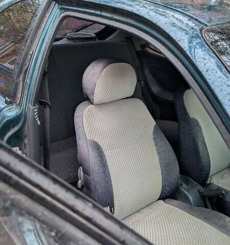 Зеленый Дэу Ланос, объемом двигателя 1.5 л и пробегом 176 тыс. км за 1600 $, фото 4 на Automoto.ua