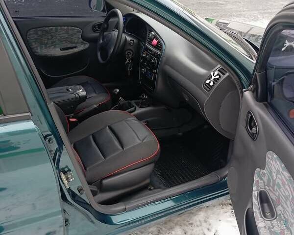 Зеленый Дэу Ланос, объемом двигателя 1.5 л и пробегом 194 тыс. км за 1950 $, фото 13 на Automoto.ua