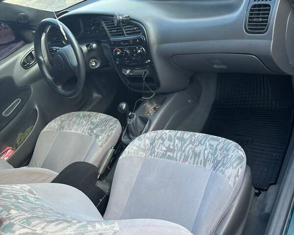 Зеленый Дэу Ланос, объемом двигателя 1.5 л и пробегом 233 тыс. км за 2850 $, фото 8 на Automoto.ua