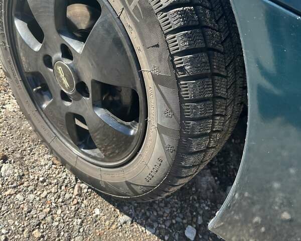 Зеленый Дэу Ланос, объемом двигателя 1.5 л и пробегом 233 тыс. км за 2850 $, фото 4 на Automoto.ua