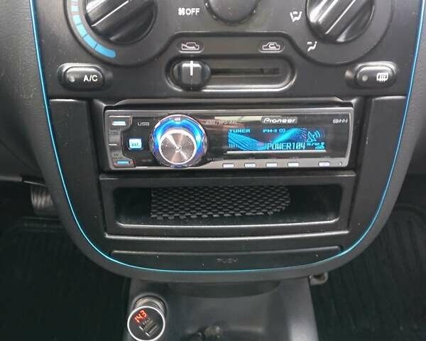 Зеленый Дэу Ланос, объемом двигателя 1.5 л и пробегом 194 тыс. км за 1950 $, фото 11 на Automoto.ua