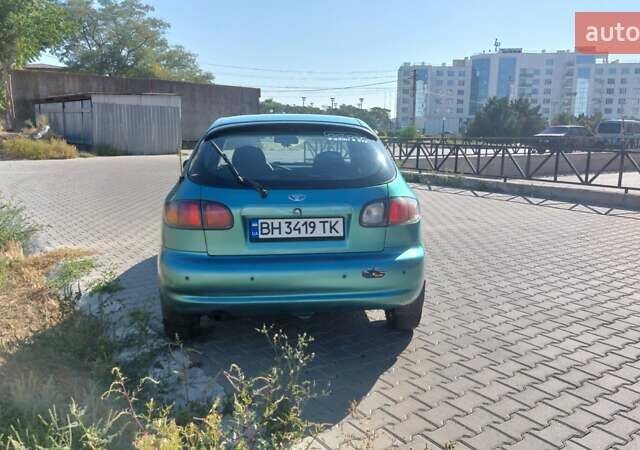 Зеленый Дэу Ланос, объемом двигателя 1.5 л и пробегом 300 тыс. км за 2500 $, фото 3 на Automoto.ua