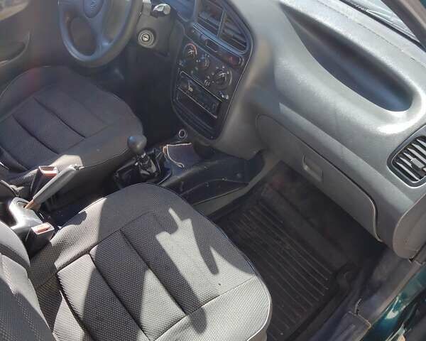 Зеленый Дэу Ланос, объемом двигателя 1.5 л и пробегом 340 тыс. км за 1900 $, фото 16 на Automoto.ua
