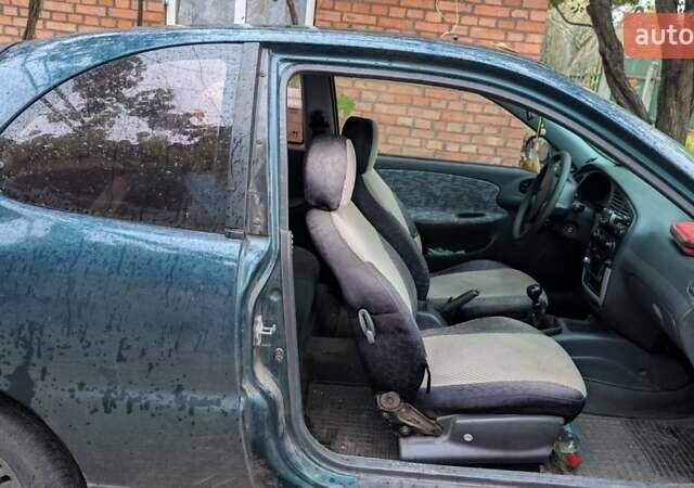 Зеленый Дэу Ланос, объемом двигателя 1.5 л и пробегом 176 тыс. км за 1600 $, фото 2 на Automoto.ua