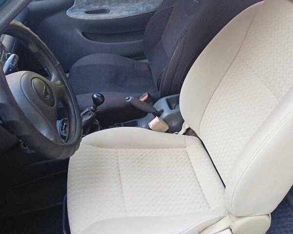 Зеленый Дэу Ланос, объемом двигателя 1.5 л и пробегом 360 тыс. км за 1600 $, фото 5 на Automoto.ua