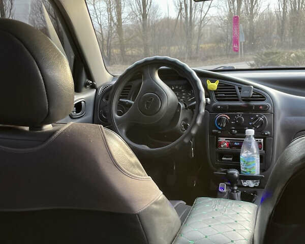 Зеленый Дэу Ланос, объемом двигателя 1.5 л и пробегом 335 тыс. км за 1900 $, фото 12 на Automoto.ua