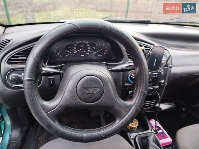 Зеленый Дэу Ланос, объемом двигателя 1.5 л и пробегом 190 тыс. км за 2200 $, фото 5 на Automoto.ua