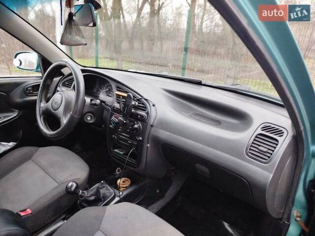 Зеленый Дэу Ланос, объемом двигателя 1.5 л и пробегом 190 тыс. км за 2200 $, фото 4 на Automoto.ua