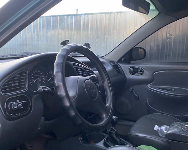 Зелений Деу Ланос, об'ємом двигуна 1.5 л та пробігом 350 тис. км за 1900 $, фото 6 на Automoto.ua