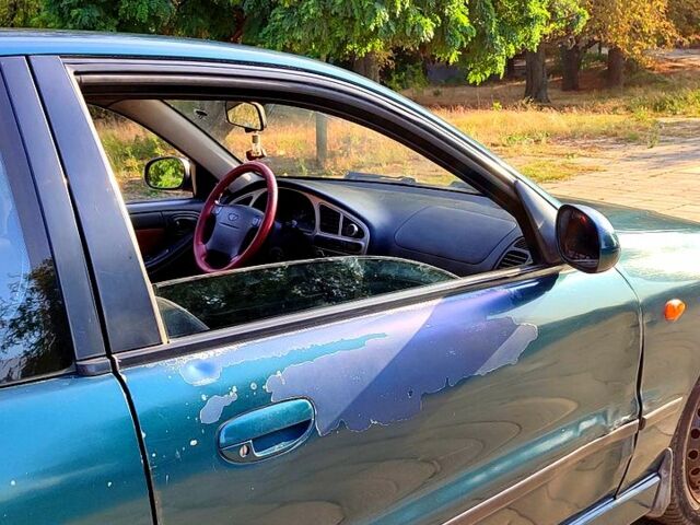 Зеленый Дэу Ланос, объемом двигателя 1.6 л и пробегом 193 тыс. км за 2500 $, фото 8 на Automoto.ua