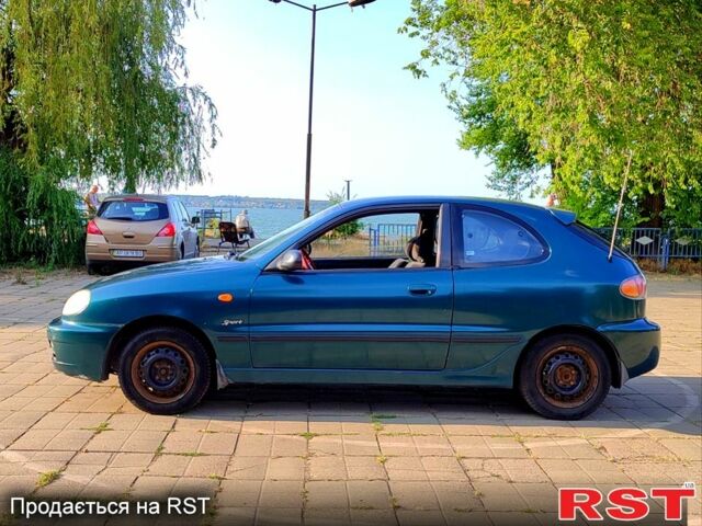Зеленый Дэу Ланос, объемом двигателя 1.6 л и пробегом 193 тыс. км за 2500 $, фото 2 на Automoto.ua