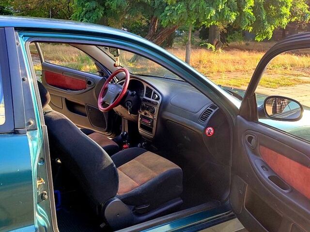 Зеленый Дэу Ланос, объемом двигателя 1.6 л и пробегом 193 тыс. км за 2500 $, фото 6 на Automoto.ua