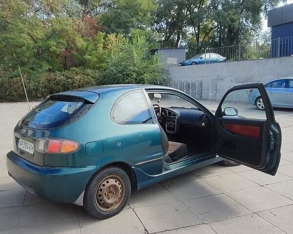 Зеленый Дэу Ланос, объемом двигателя 1.6 л и пробегом 192 тыс. км за 2000 $, фото 2 на Automoto.ua