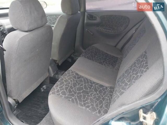 Зеленый Дэу Ланос, объемом двигателя 1.5 л и пробегом 300 тыс. км за 2150 $, фото 6 на Automoto.ua