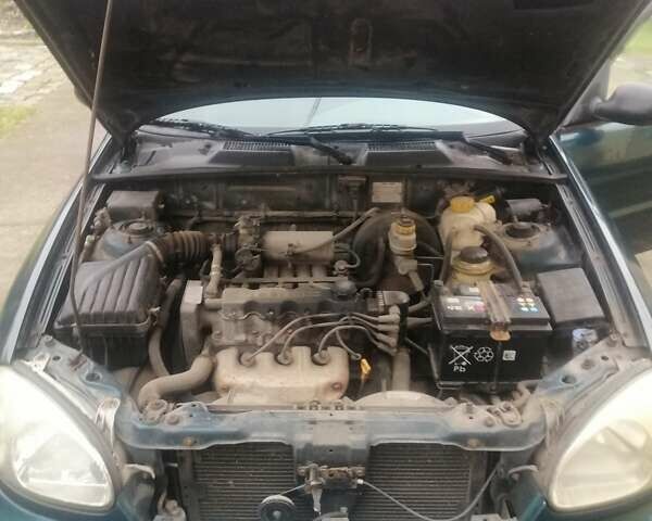 Зеленый Дэу Ланос, объемом двигателя 1.5 л и пробегом 228 тыс. км за 2500 $, фото 7 на Automoto.ua