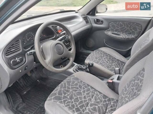 Зеленый Дэу Ланос, объемом двигателя 1.5 л и пробегом 300 тыс. км за 2150 $, фото 5 на Automoto.ua