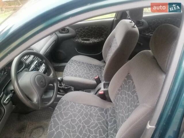 Зеленый Дэу Ланос, объемом двигателя 1.5 л и пробегом 228 тыс. км за 2500 $, фото 14 на Automoto.ua