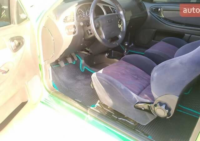 Зелений Деу Ланос, об'ємом двигуна 1.6 л та пробігом 339 тис. км за 3500 $, фото 43 на Automoto.ua