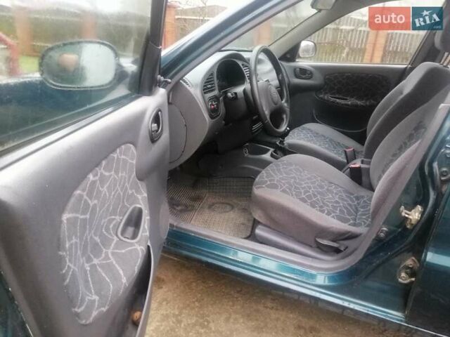 Зеленый Дэу Ланос, объемом двигателя 1.5 л и пробегом 228 тыс. км за 2500 $, фото 16 на Automoto.ua