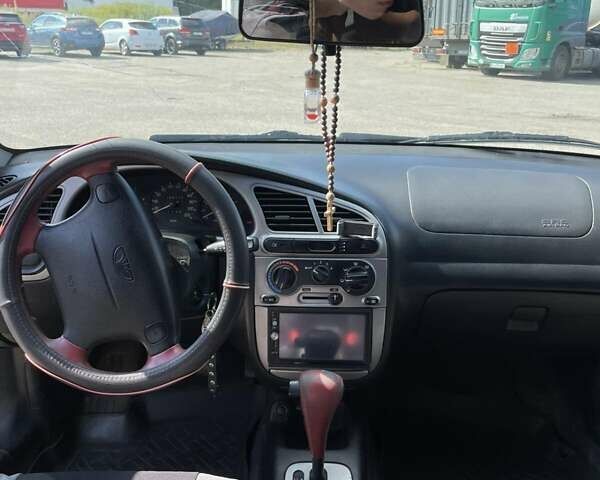 Зелений Деу Ланос, об'ємом двигуна 1.6 л та пробігом 165 тис. км за 3500 $, фото 8 на Automoto.ua