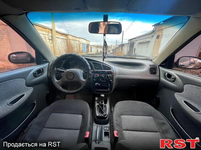 Зеленый Дэу Ланос, объемом двигателя 1.5 л и пробегом 253 тыс. км за 3300 $, фото 11 на Automoto.ua